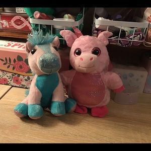 Assortment of stuffed animals and beanies